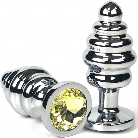 Серебристая ребристая анальная пробка с желтым кристаллом - 6 см.