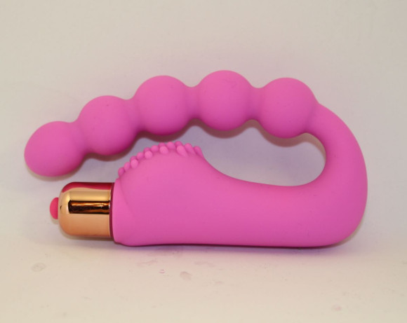 Розовый силиконовый вибромассажер в форме подковы Розовый силиконовый вибромассажер в форме подковы