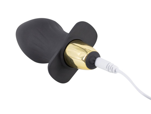 Черная силиконовая анальная пробка с вибрацией - 10,5 см. Черная силиконовая анальная пробка с вибрацией - 10,5 см.